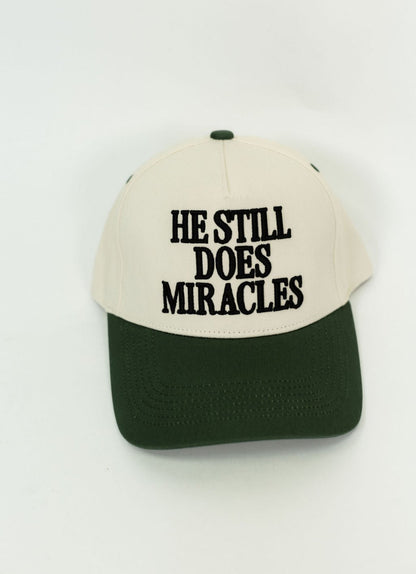 He Still Does Miracles Trucker Hat