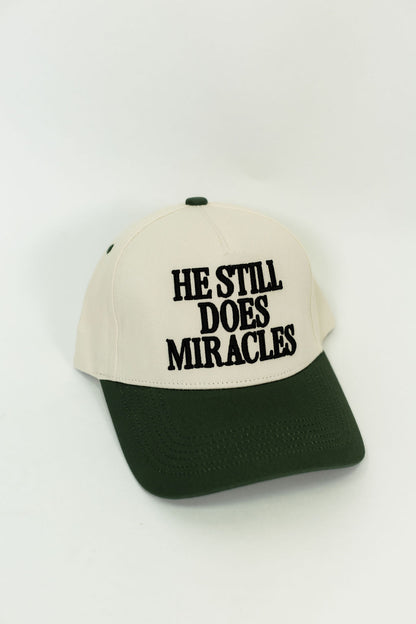 He Still Does Miracles Trucker Hat